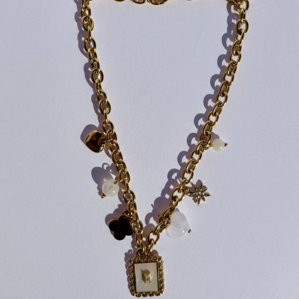Collier Multi Charms- Collier doré avec pendentifs étoile, cœur et charms en acier inoxydable