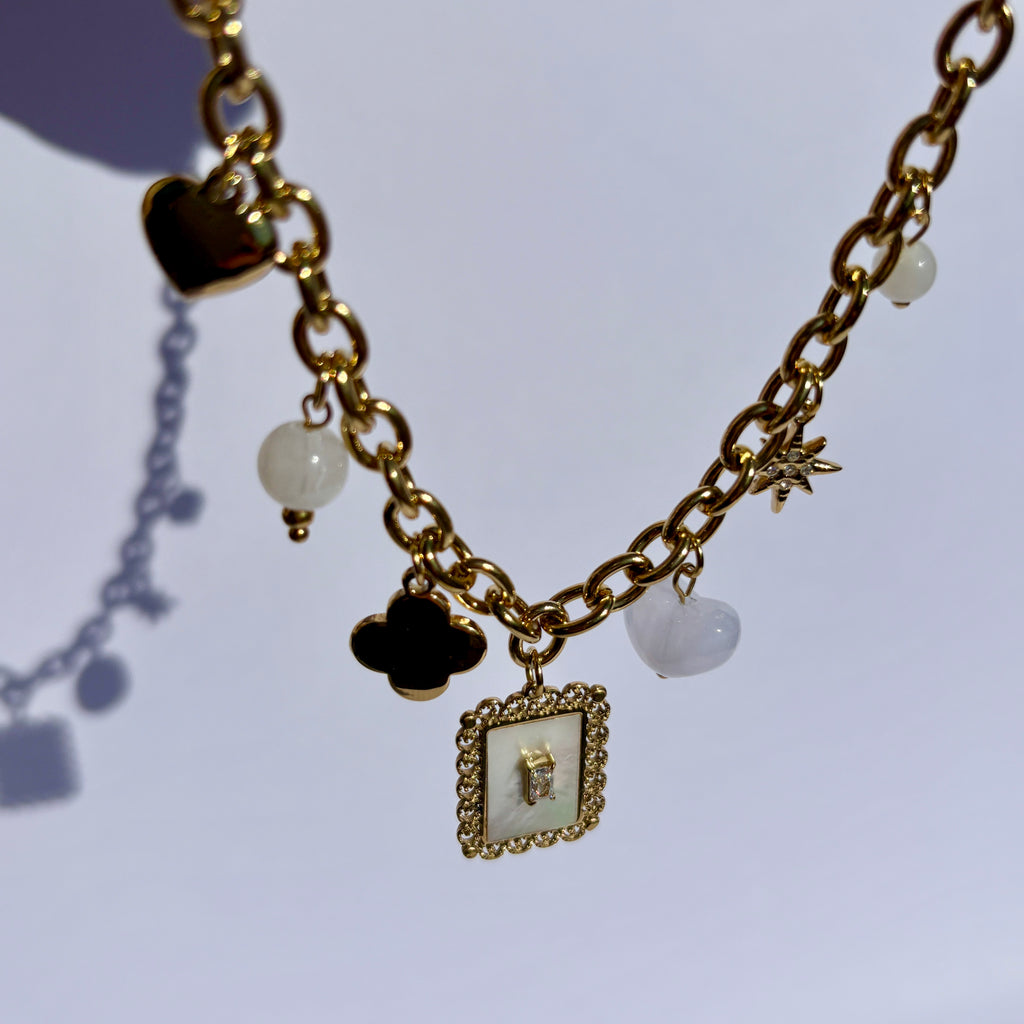 Collier Multi Charms- Collier doré avec pendentifs étoile, cœur et charms en acier inoxydable