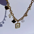 Collier Multi Charms- Collier doré avec pendentifs étoile, cœur et charms en acier inoxydable