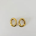 Boucles d’oreilles Elia - boucles d'oreilles dorées rondes évidées en acier inoxydable